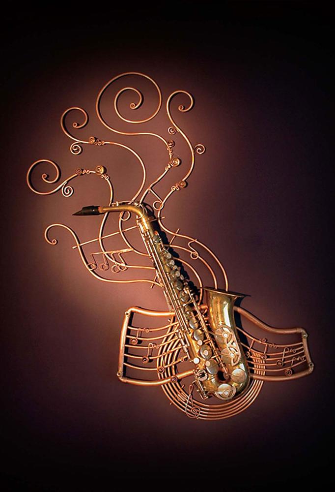 Wall sculpture made from a sax and formed copper tube.